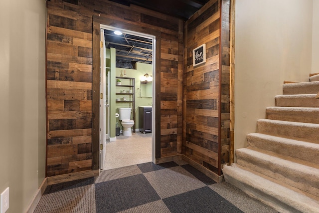 2017 Cumberland Dr, Brighton, MI 48114 - corridor featuring wooden walls and stairway