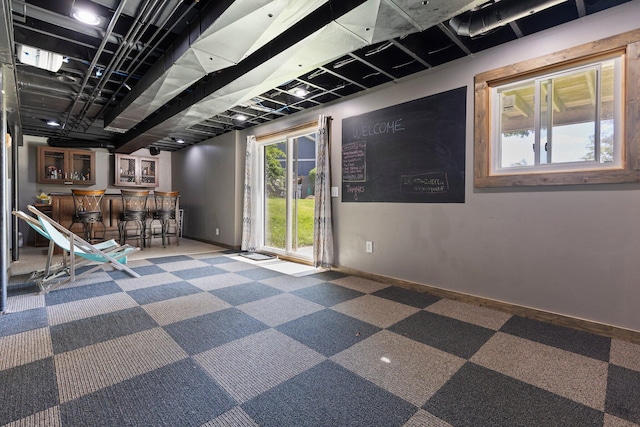2017 Cumberland Dr, Brighton, MI 48114 - below grade area featuring bar area and carpet flooring