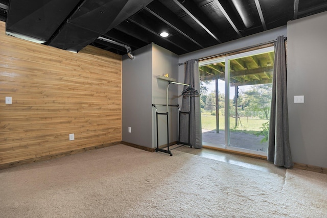 2017 Cumberland Dr, Brighton, MI 48114 - empty room with carpet floors and wood walls