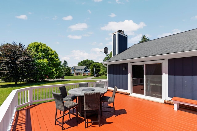 2017 Cumberland Dr, Brighton, MI 48114 - wooden terrace with outdoor dining space and a lawn