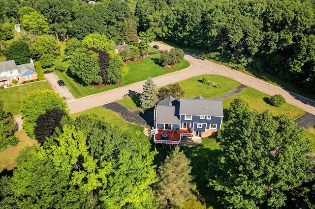 2017 Cumberland Dr, Brighton, MI 48114 - aerial view of property and surrounding area featuring a heavily wooded area