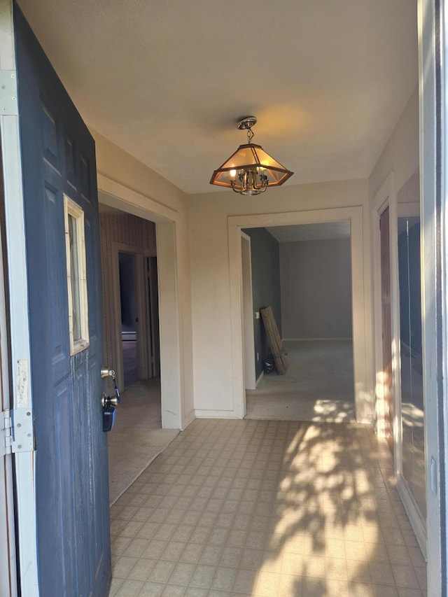 505 N Pine St, Evart, MI 49631 - hall with a chandelier