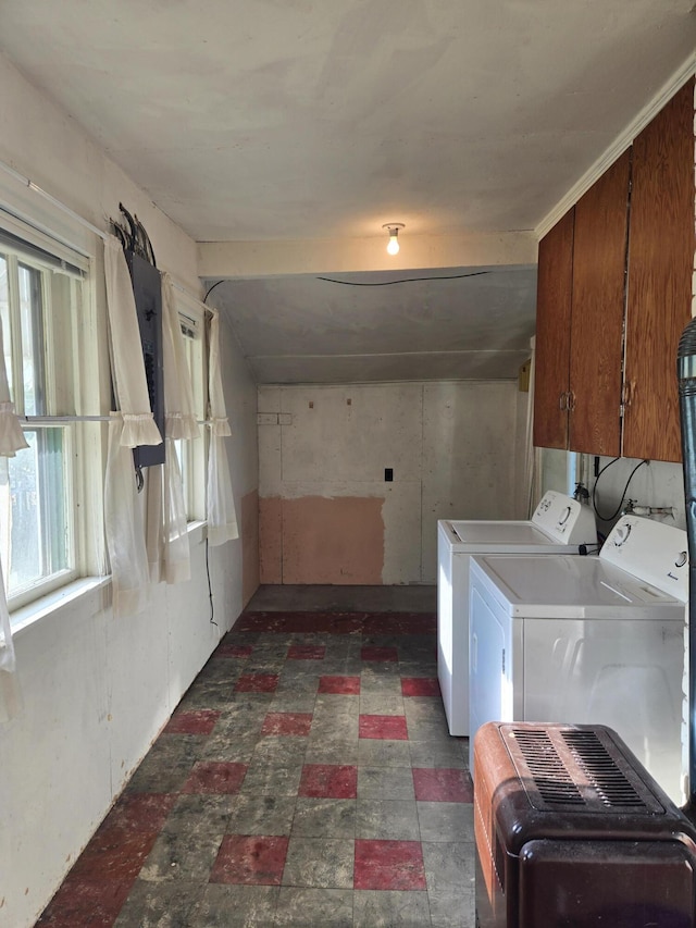 505 N Pine St, Evart, MI 49631 - laundry room with cabinet space and washer and clothes dryer
