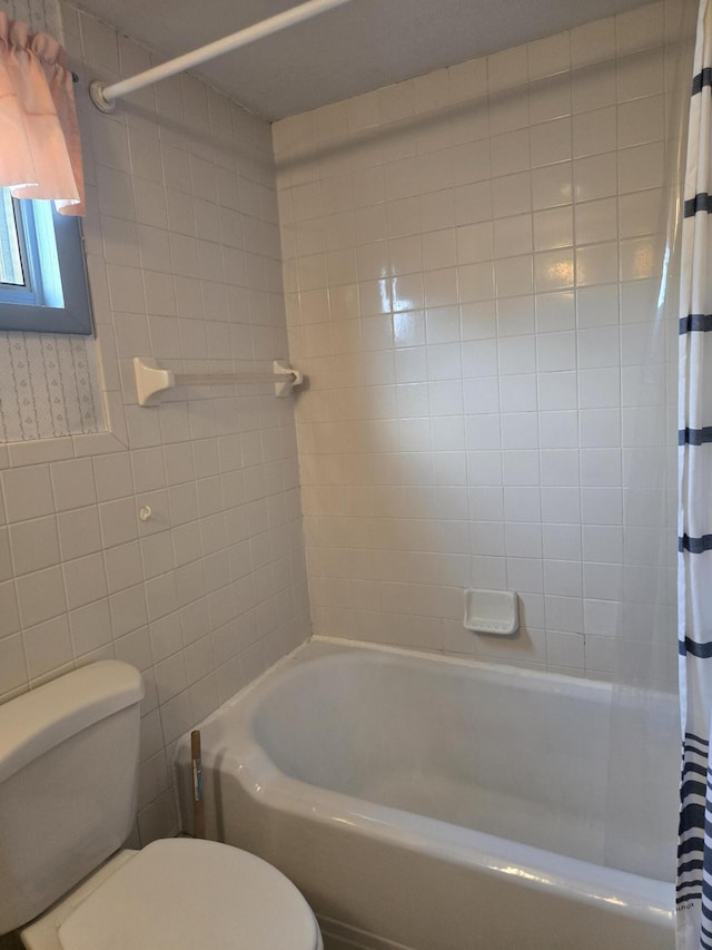 505 N Pine St, Evart, MI 49631 - bathroom with shower / bath combination with curtain and tile walls