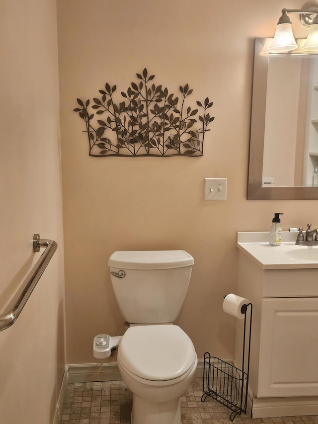 227 W Nelson St, Hastings, MI 49058 - bathroom with vanity and baseboards