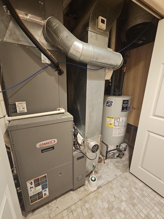 227 W Nelson St, Hastings, MI 49058 - utility room with water heater