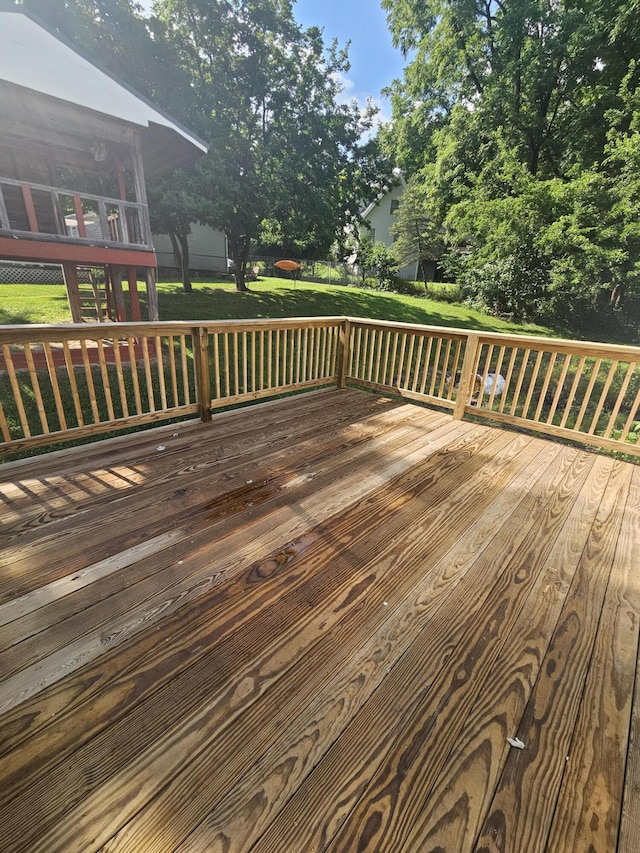 227 W Nelson St, Hastings, MI 49058 - wooden terrace featuring a yard