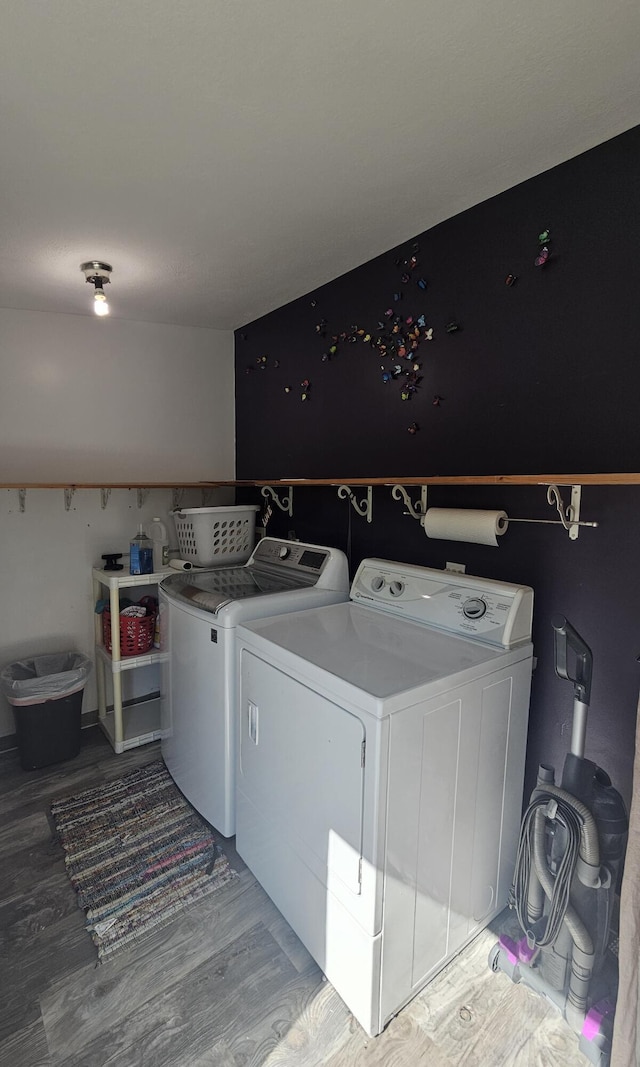 227 W Nelson St, Hastings, MI 49058 - washroom featuring washer and dryer and light wood-style flooring
