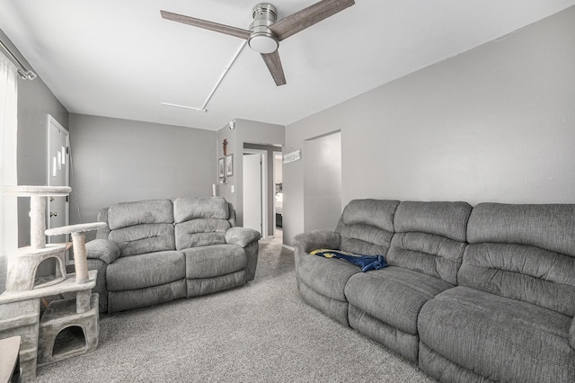 2620 Charlesgate Ave SW, Wyoming, MI 49509 - carpeted living area with attic access and a ceiling fan