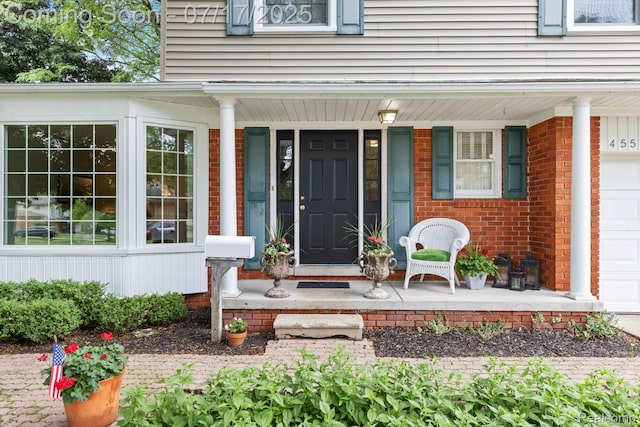 455 Leicester St, Plymouth, MI 48170 - property entrance featuring covered porch and brick siding