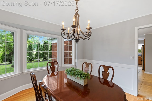 455 Leicester St, Plymouth, MI 48170 - dining space featuring a chandelier, ornamental molding, and light wood-style floors