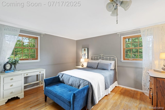 455 Leicester St, Plymouth, MI 48170 - bedroom featuring light wood finished floors, multiple windows, and ceiling fan