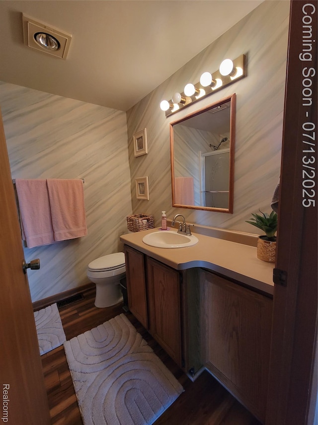 14373 Racho Blvd, Taylor, MI 48180 - bathroom featuring vanity and wood finished floors