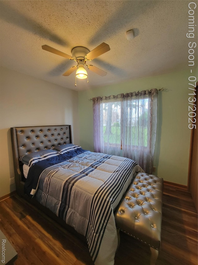 14373 Racho Blvd, Taylor, MI 48180 - bedroom with wood finished floors, a textured ceiling, and ceiling fan