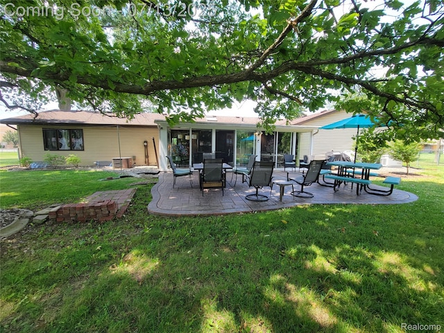 14373 Racho Blvd, Taylor, MI 48180 - back of property with a patio and a yard
