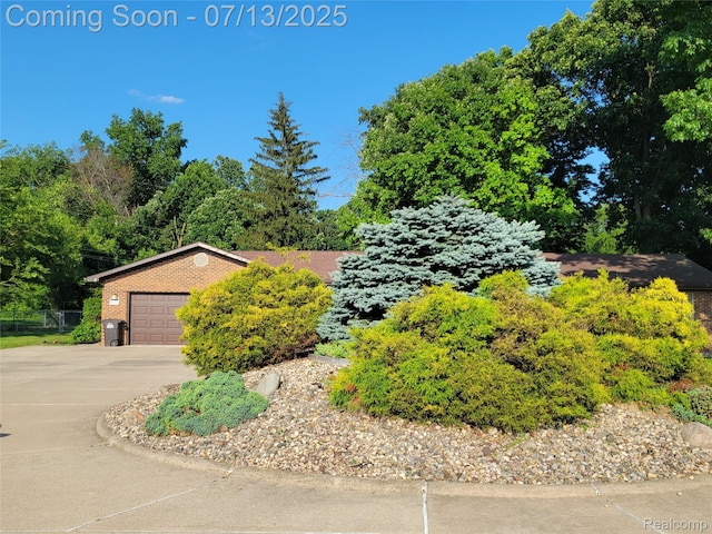 14373 Racho Blvd, Taylor, MI 48180 - view of front of property with driveway and brick siding