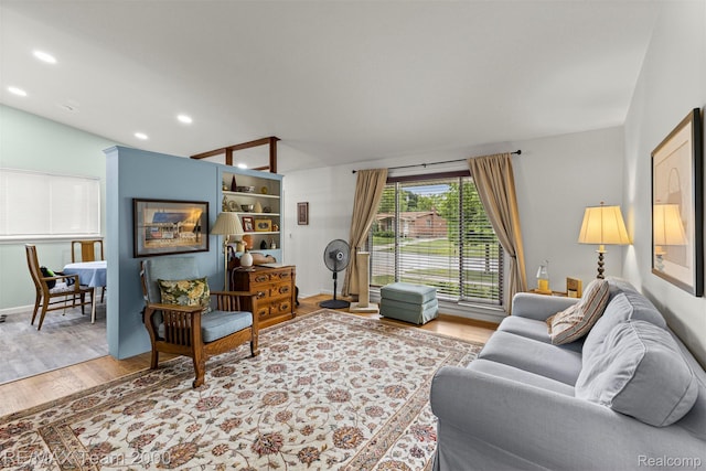 7396 N Charlesworth St, Dearborn Heights, MI 48127 - living room with wood finished floors, recessed lighting, and vaulted ceiling