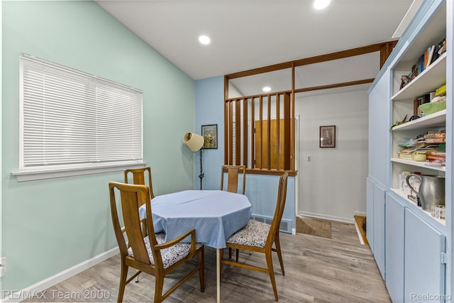 7396 N Charlesworth St, Dearborn Heights, MI 48127 - dining room featuring light wood-type flooring, recessed lighting, and vaulted ceiling