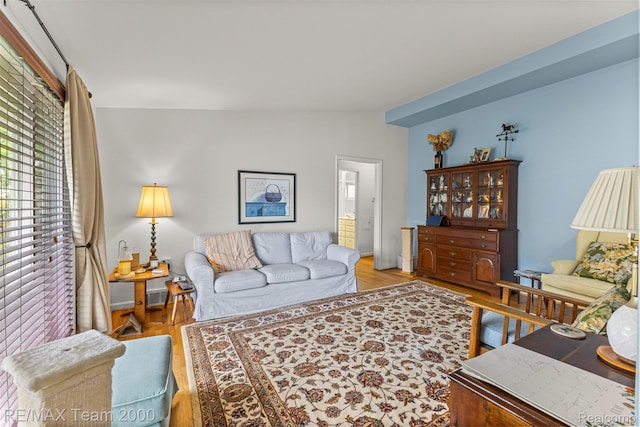 7396 N Charlesworth St, Dearborn Heights, MI 48127 - living room featuring wood finished floors