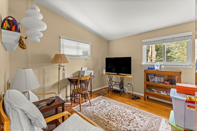 7396 N Charlesworth St, Dearborn Heights, MI 48127 - sitting room featuring lofted ceiling and wood finished floors