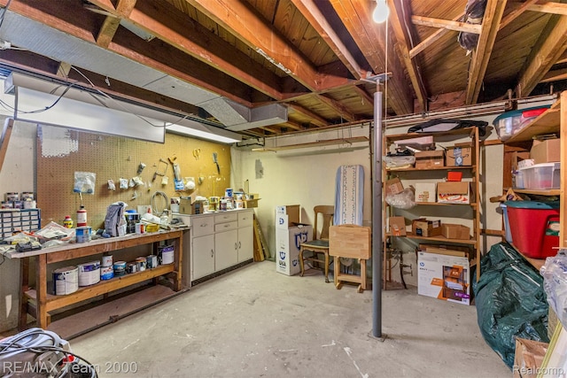 7396 N Charlesworth St, Dearborn Heights, MI 48127 - unfinished basement featuring a workshop area