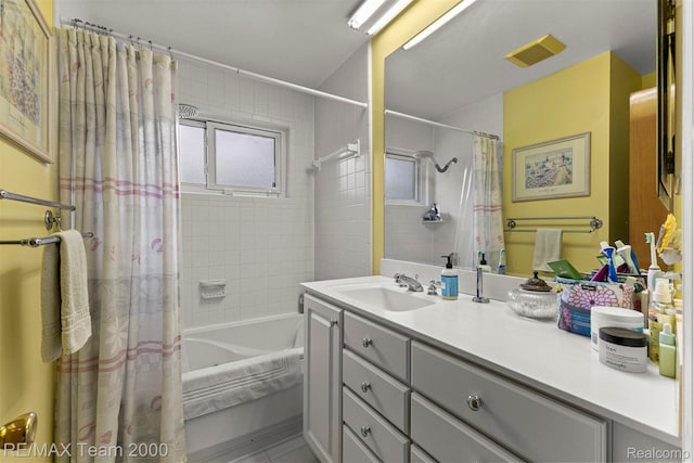7396 N Charlesworth St, Dearborn Heights, MI 48127 - full bathroom featuring shower / bath combo with shower curtain, vanity, and tile patterned floors