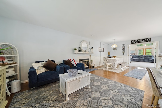 514 Sulley St, Waterford, MI 48327 - living room featuring wood finished floors and a tile fireplace