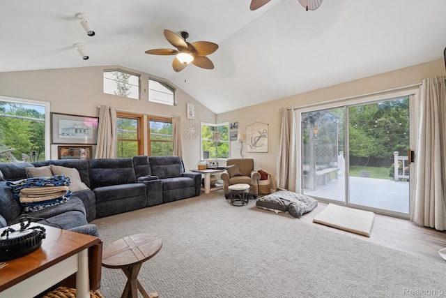 514 Sulley St, Waterford, MI 48327 - living room featuring a ceiling fan, vaulted ceiling, plenty of natural light, and carpet
