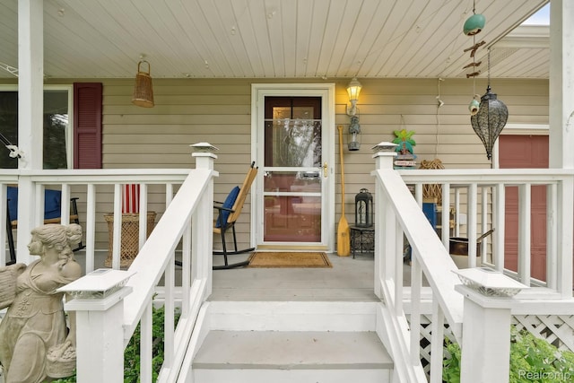 514 Sulley St, Waterford, MI 48327 - property entrance with a porch