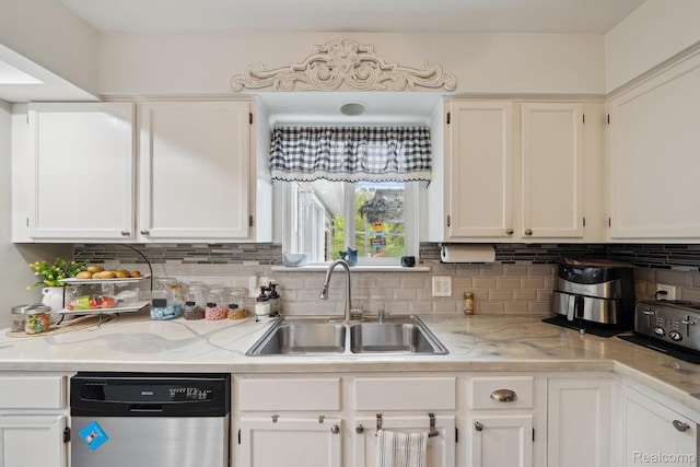514 Sulley St, Waterford, MI 48327 - kitchen with dishwasher, white cabinets, backsplash, and light stone counters