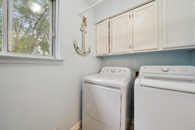 514 Sulley St, Waterford, MI 48327 - laundry room with cabinet space and washer and dryer