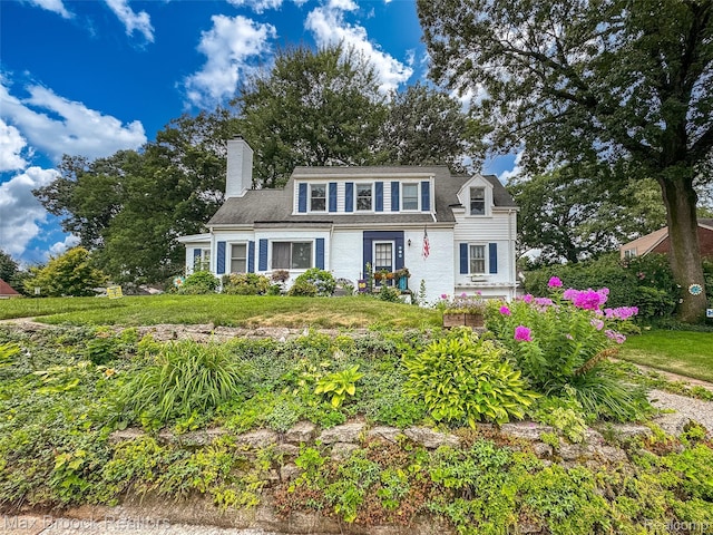 611 N Melborn St, Dearborn, MI 48128 - view of front facade featuring a chimney