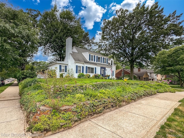 611 N Melborn St, Dearborn, MI 48128 - traditional-style house with a chimney