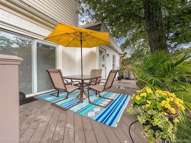 611 N Melborn St, Dearborn, MI 48128 - wooden terrace with outdoor dining area