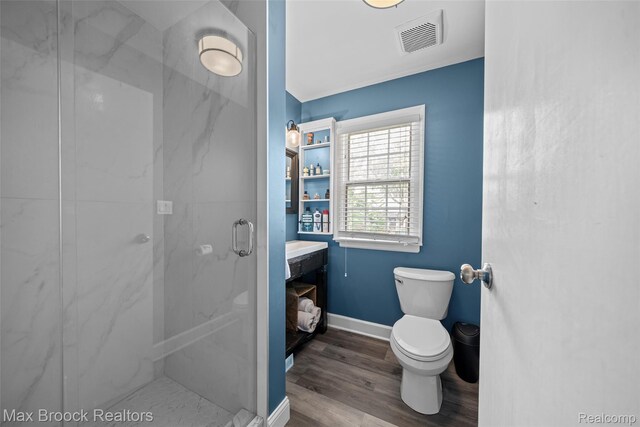 611 N Melborn St, Dearborn, MI 48128 - full bathroom with a marble finish shower, wood finished floors, and vanity