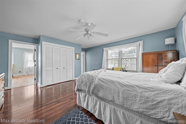 611 N Melborn St, Dearborn, MI 48128 - bedroom featuring multiple windows, a closet, wood finished floors, and ceiling fan