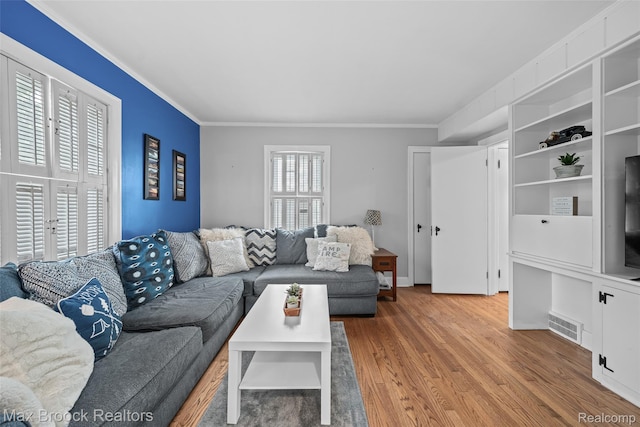 611 N Melborn St, Dearborn, MI 48128 - living area with crown molding and wood finished floors
