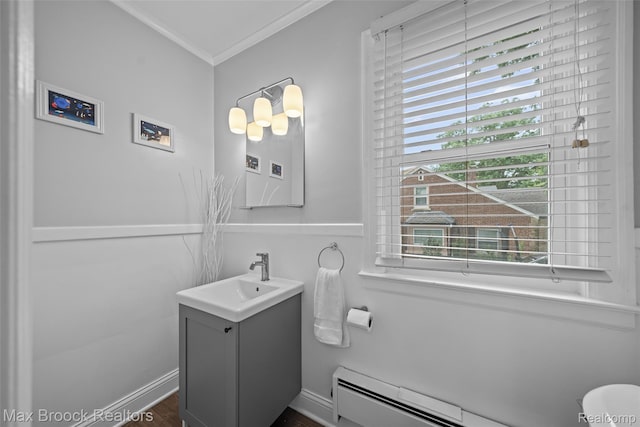 611 N Melborn St, Dearborn, MI 48128 - bathroom with vanity, ornamental molding, a baseboard radiator, and wood finished floors