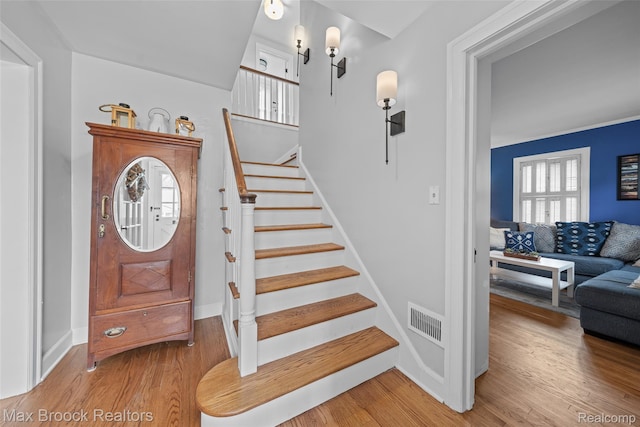 611 N Melborn St, Dearborn, MI 48128 - stairs featuring plenty of natural light and wood finished floors