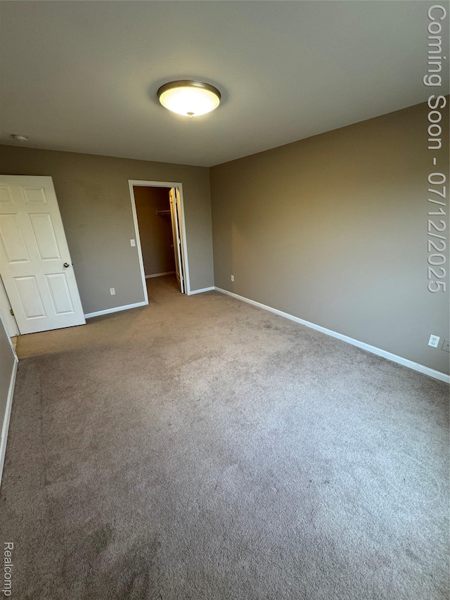 45562 Warwick Dr, Macomb, MI 48044 - unfurnished bedroom with carpet and a spacious closet