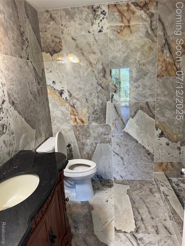45562 Warwick Dr, Macomb, MI 48044 - full bathroom featuring tile walls and vanity