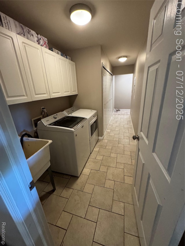 45562 Warwick Dr, Macomb, MI 48044 - washroom featuring independent washer and dryer and cabinet space