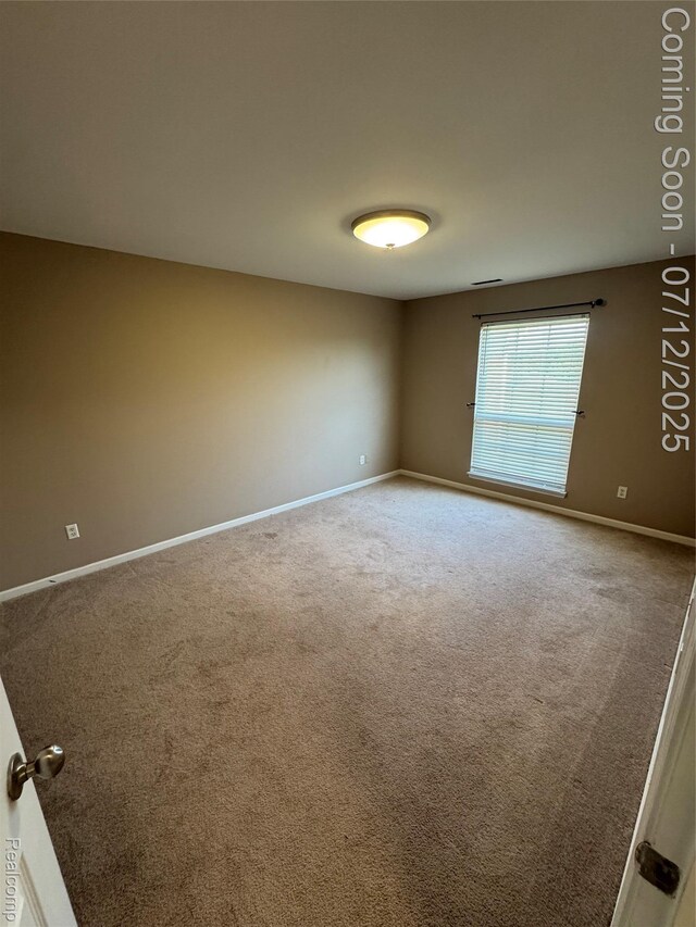 45562 Warwick Dr, Macomb, MI 48044 - carpeted empty room featuring baseboards