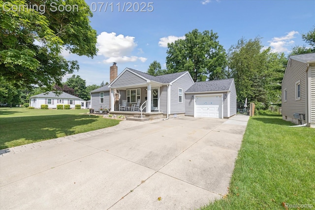 1338 W King St, Owosso, MI 48867 - view of front of property featuring a porch, concrete driveway, a front lawn, a chimney, and a garage