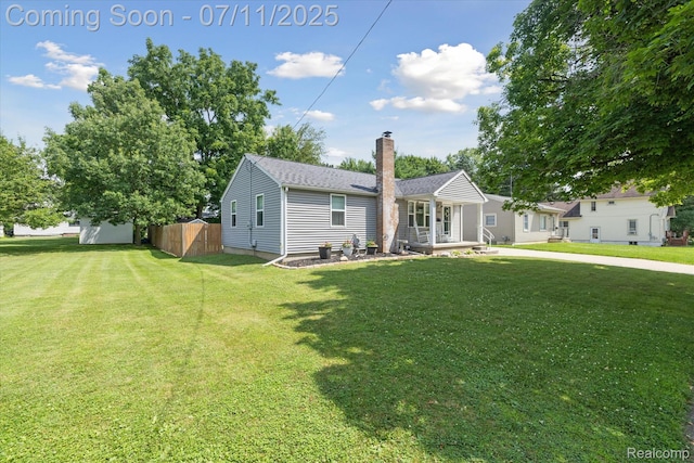 1338 W King St, Owosso, MI 48867 - ranch-style house with a chimney