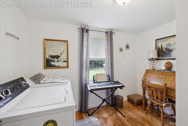 1338 W King St, Owosso, MI 48867 - washroom featuring washer and clothes dryer and light wood finished floors