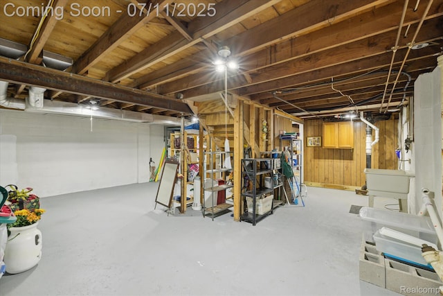 1338 W King St, Owosso, MI 48867 - unfinished basement featuring a sink