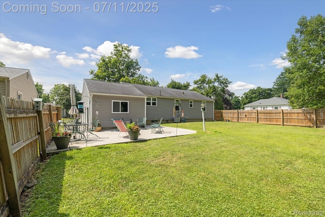 1338 W King St, Owosso, MI 48867 - rear view of property with a patio area and a fenced backyard