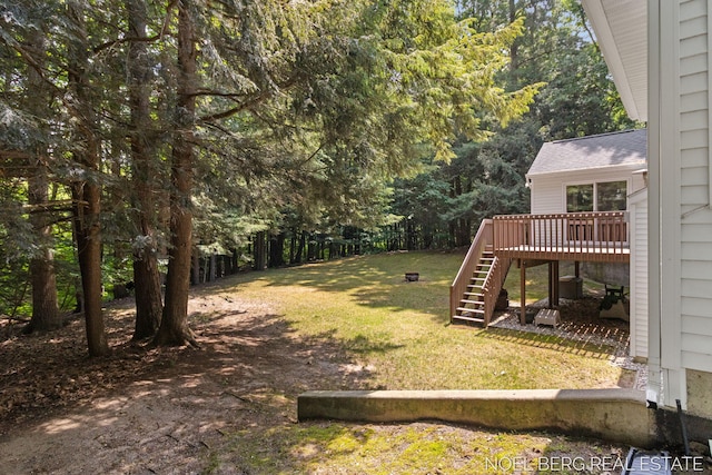 13462 Ravine View Dr, Grand Haven, MI 49417 - view of grassy yard with stairs and a wooden deck