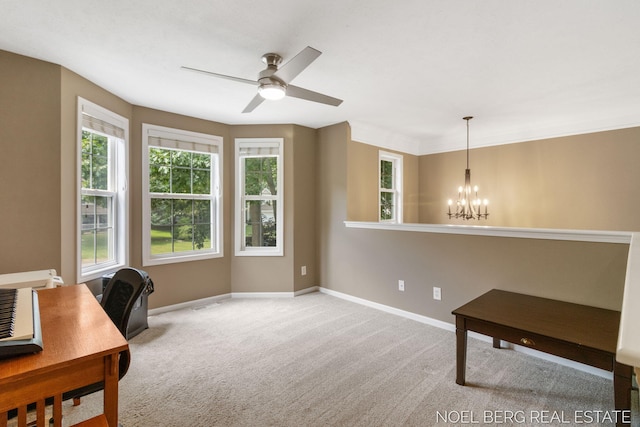 13462 Ravine View Dr, Grand Haven, MI 49417 - home office with a chandelier, ceiling fan, and carpet